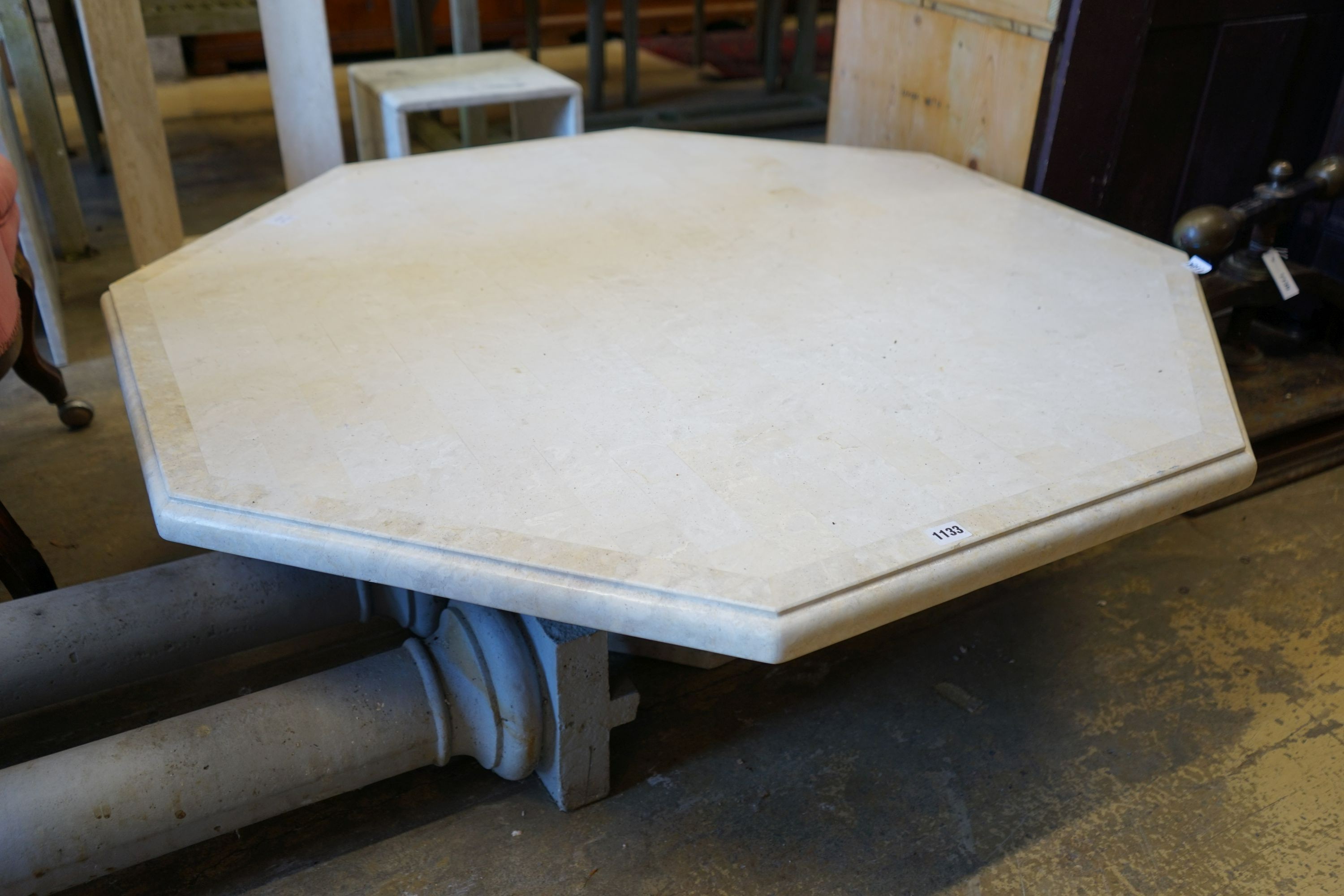 A large contemporary octagonal reconstituted marble coffee table, width 120cm height 38cm